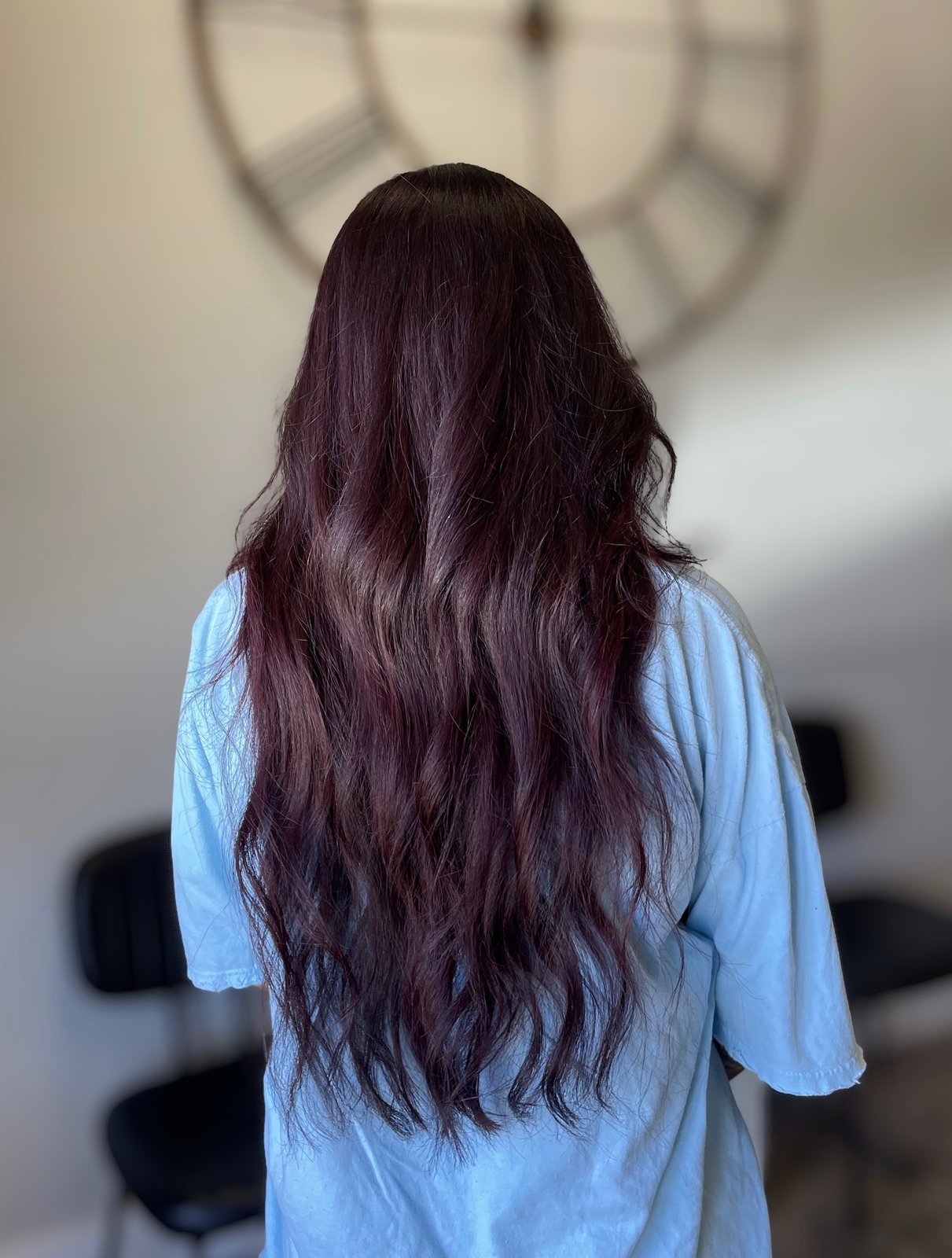 Burgundy plum red color on long wavy hair — Logan, Utah