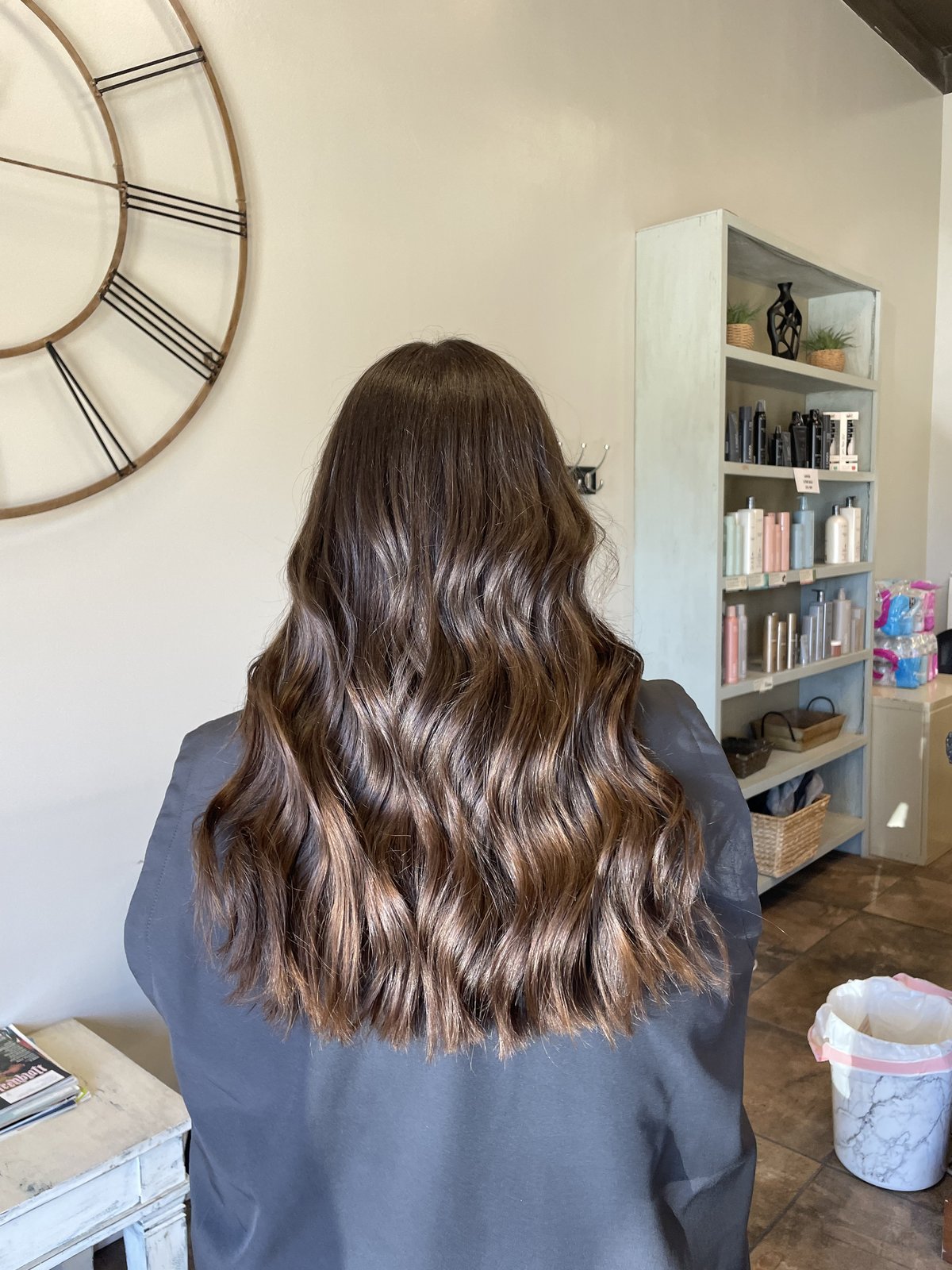 Rich chocolate brown with subtle caramel ribbons, long waves